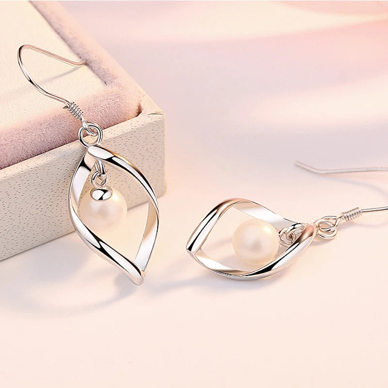 Hollow Leaf Pearl Drop Earrings - Whispers of Grace