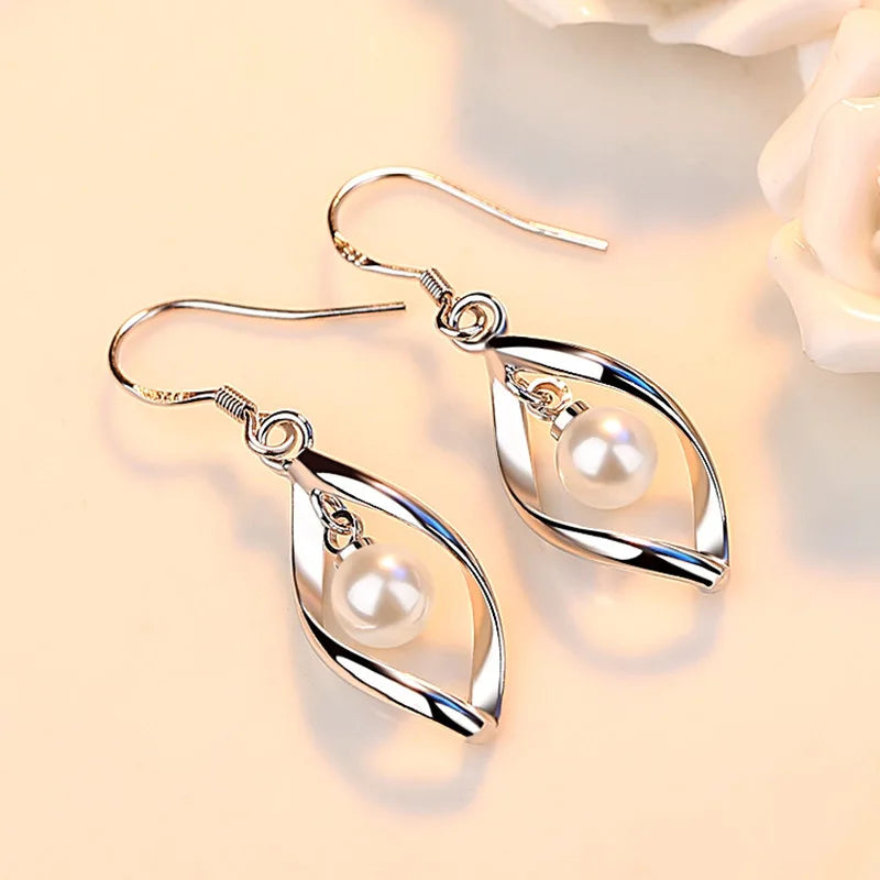 Hollow Leaf Pearl Drop Earrings - Whispers of Grace