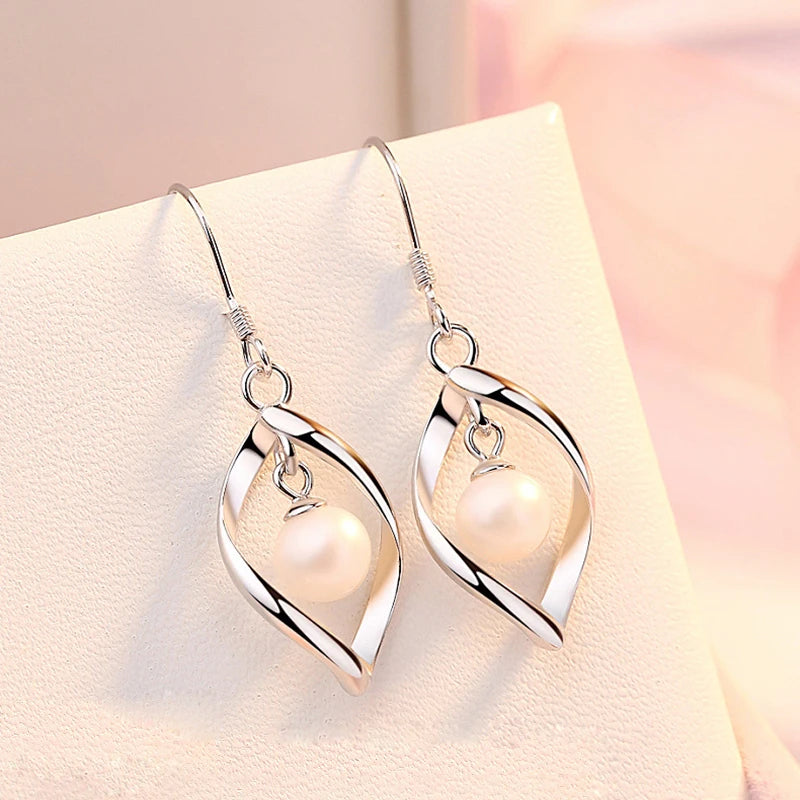 Hollow Leaf Pearl Drop Earrings - Whispers of Grace