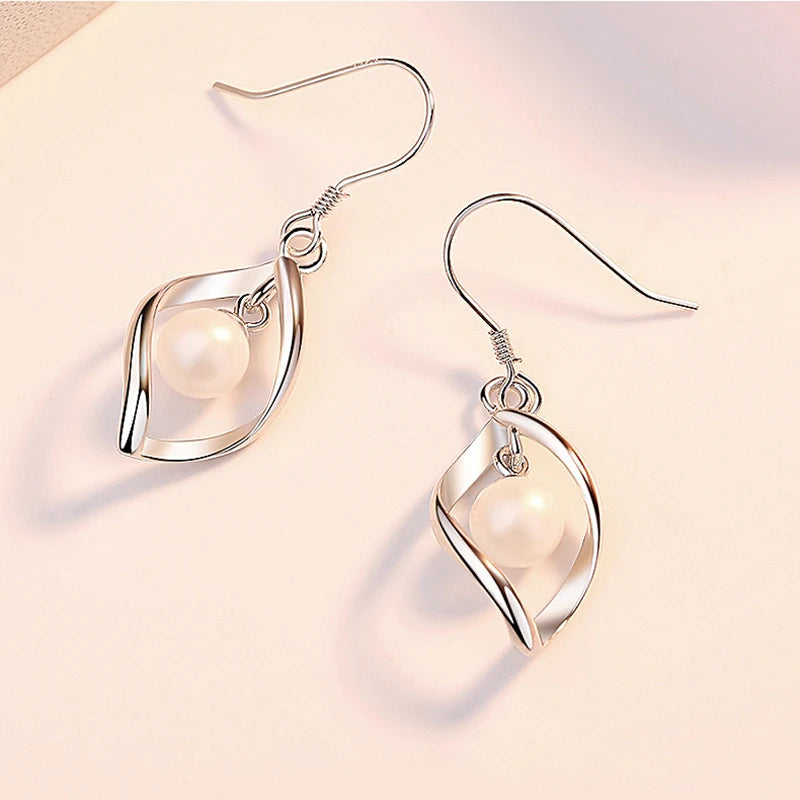 Hollow Leaf Pearl Drop Earrings - Whispers of Grace