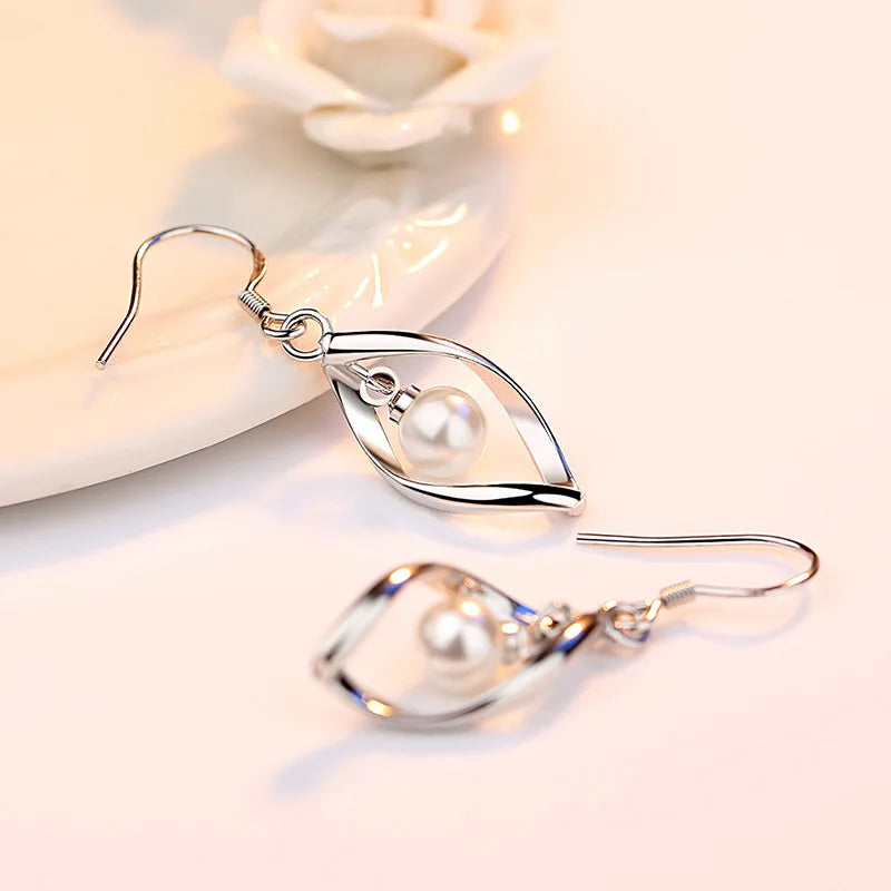 Hollow Leaf Pearl Drop Earrings - Whispers of Grace